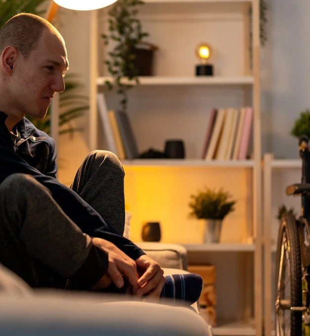 man-sitting-with-wheelchair (desktop)